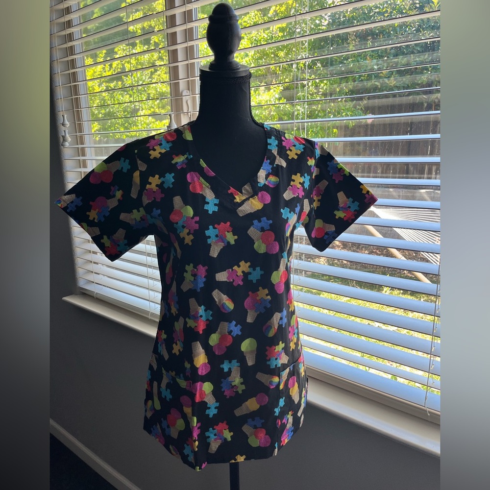 Bio Bring it On Scrub Top. Small. Black w ice cream cones & puzzle pieces.